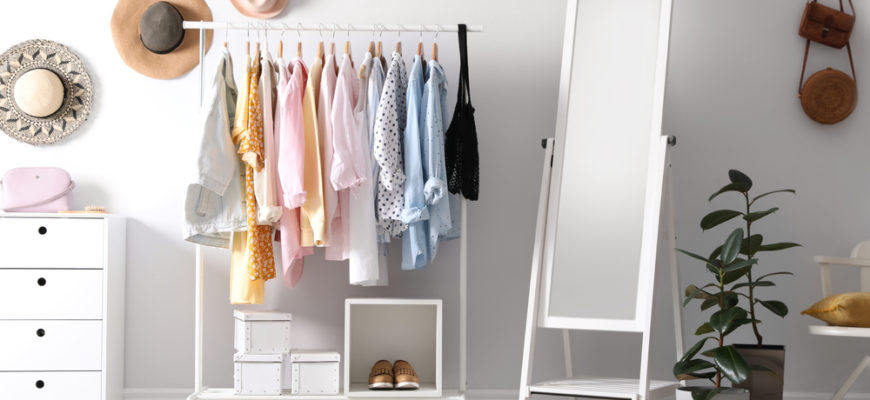 Rack,With,Stylish,Women's,Clothes,And,Mirror,Indoors.,Interior,Design