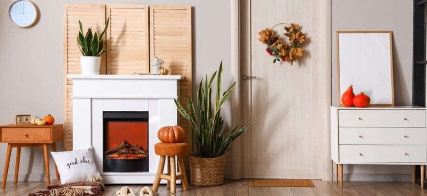 Interior,Of,Living,Room,With,Autumn,Decor,And,Fireplace