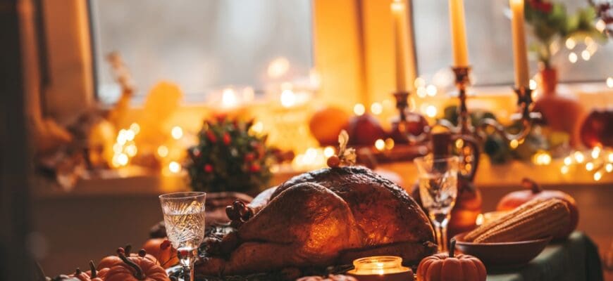 Thanksgiving,Day,Dinner,With,Holiday,Autumn,Decor,And,Candles.,Family